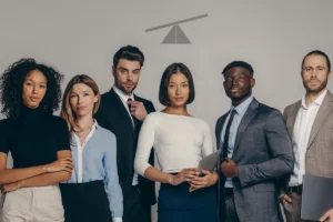 Diverse professional team in formal attire standing together