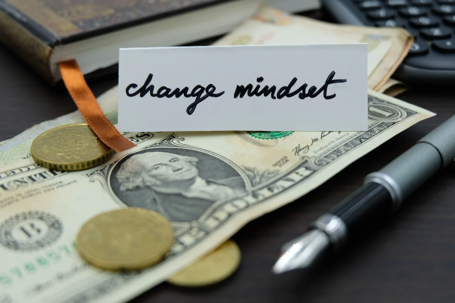 Change mindset card on money and desk items