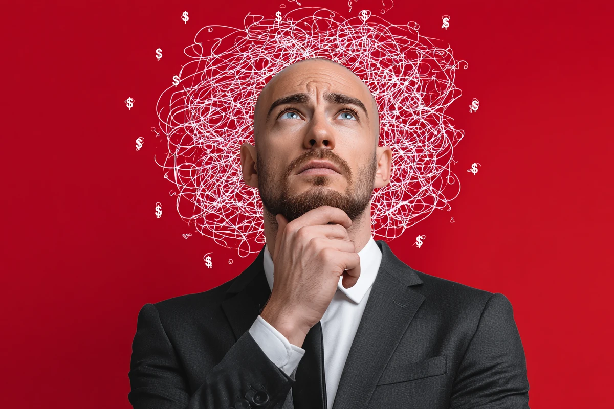 Man pondering with abstract money thoughts on red background