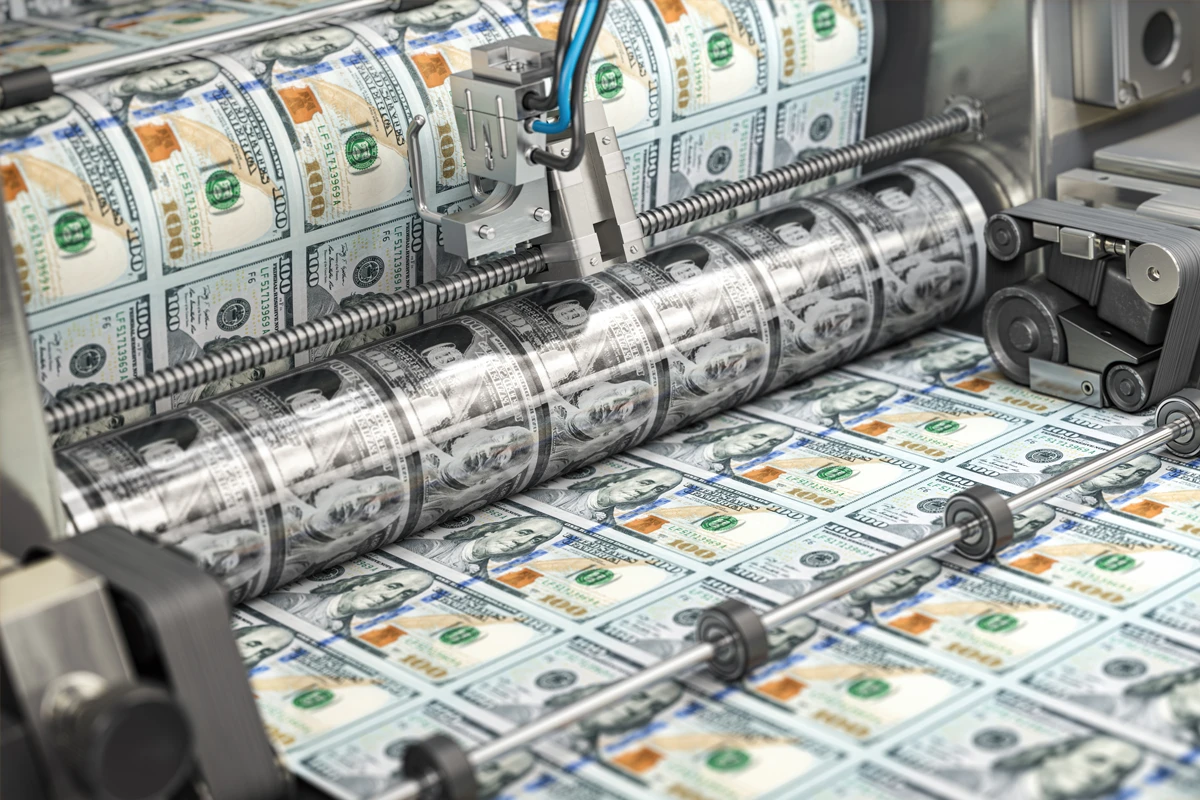 a machine with a roll of money